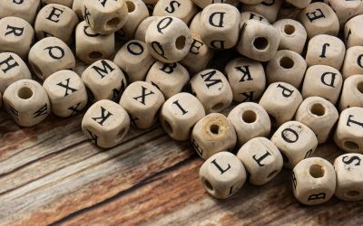 Photo of a jumble of letter cubes to illustrate the article 